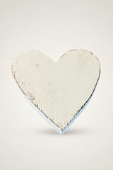 Wooden heart-shaped coaster on a white background