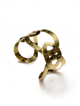 Gold cuff on a white background