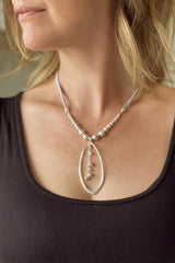 Oval Beaded Pendant Nk On Suede