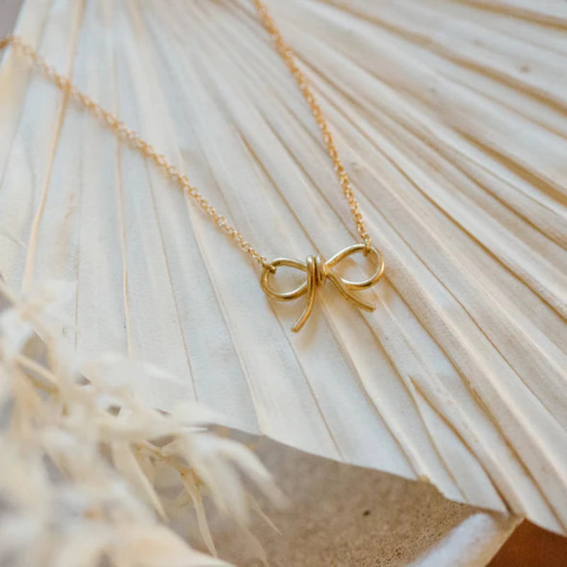 Utepe Brass Bow Necklace